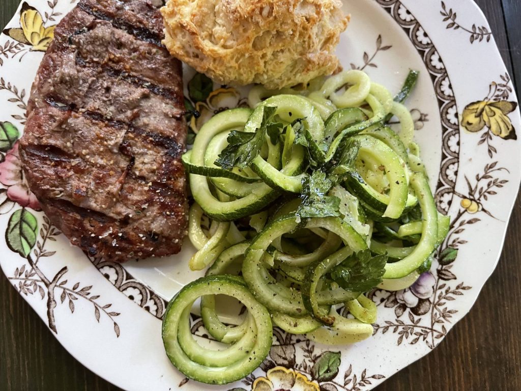 pastured steak, zucchini noodles, biscuit