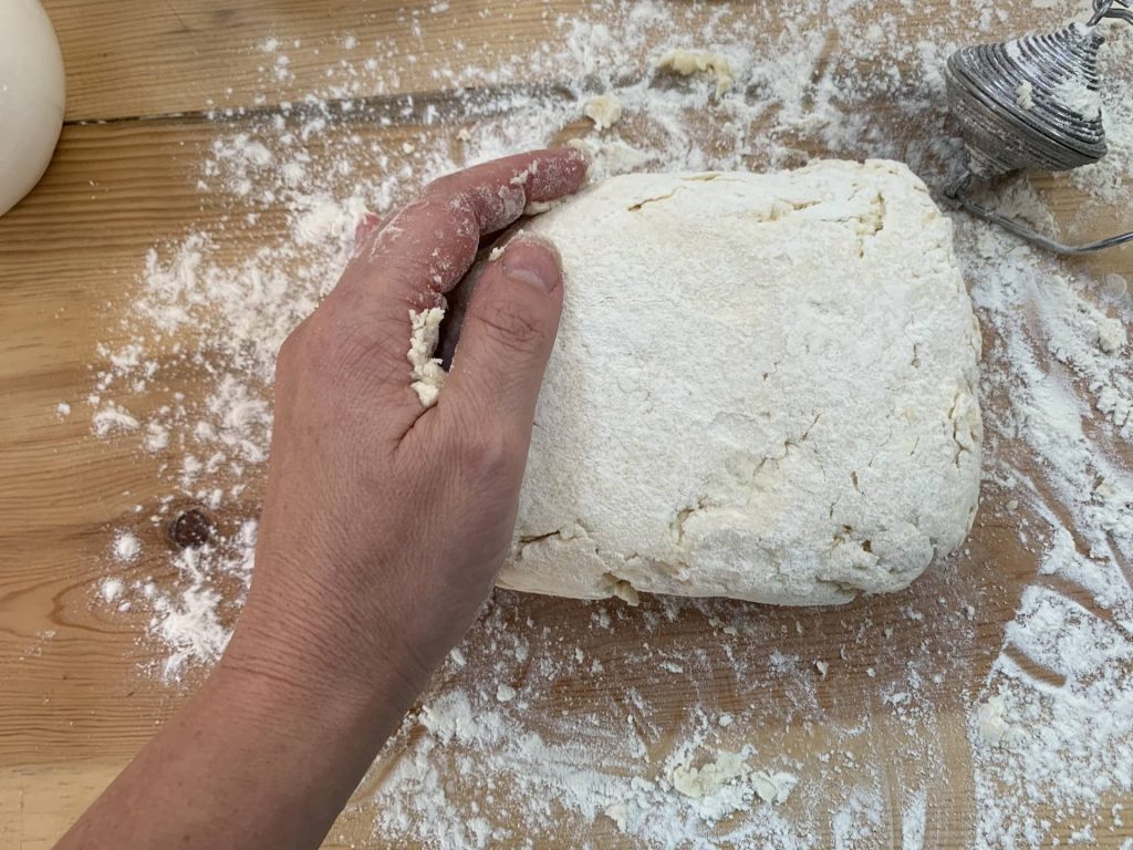 turn biscuit dough over