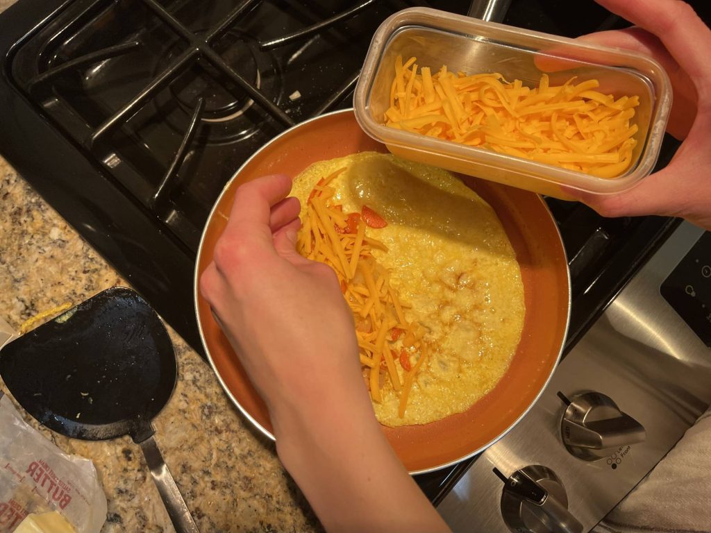 Alyssa making omelets