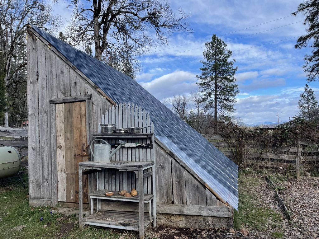 A-frame greenhouse with mismatched panel