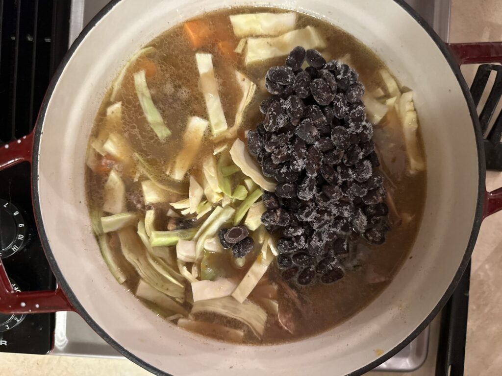 Cabbage and black beans in the soup pot